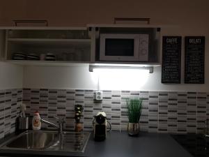 KST Apartmanにあるキッチンまたは簡易キッチン
