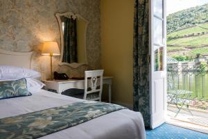 Uma cama ou camas num quarto em The Vintage House - Douro