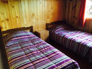 Ένα ή περισσότερα κρεβάτια σε δωμάτιο στο Cabana en Las Cascadas +7 φωτογραφίες