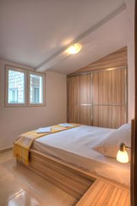 Postel nebo postele na pokoji v ubytování Guest House Maslina