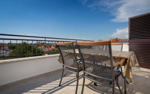 En balkon eller terrasse på Apartments Maller