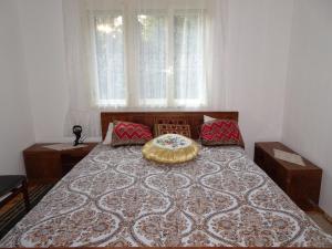 Un pat sau paturi într-o cameră la Holiday Home Crkvina