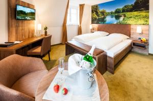 TV a/nebo společenská místnost v ubytování Hotel Hilker