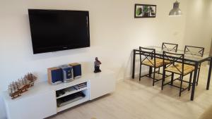 TV a/nebo společenská místnost v ubytování Apartamento vacacional