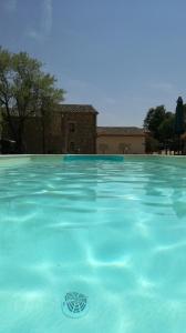 The swimming pool at or close to Casale Montemoro