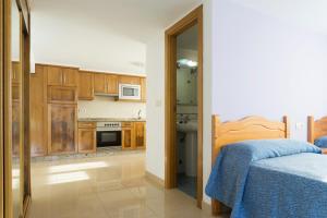 Kuchyň nebo kuchyňský kout v ubytování Casa Codesal Apartamentos