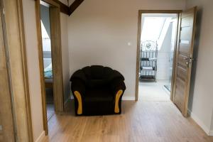 Posezení v ubytování Mazurskie Apartamenty
