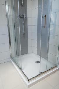 Koupelna v ubytování Mazurskie Apartamenty + 29 fotografií