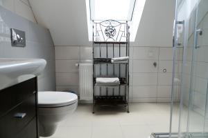 Koupelna v ubytování Mazurskie Apartamenty