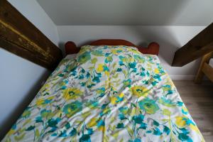Postel nebo postele na pokoji v ubytování Mazurskie Apartamenty
