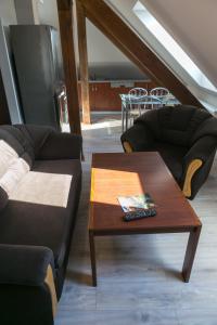 Posezení v ubytování Mazurskie Apartamenty