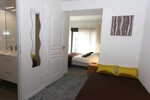 Postel nebo postele na pokoji v ubytování Hôtel De L'Ill + 37 fotografií