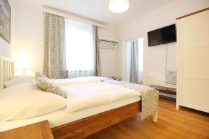 Posteľ alebo postele v izbe v ubytovaní Villa Gallistl