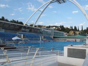 a view of a swimming pool with a roller coaster at Apartment Massimo in Rijeka