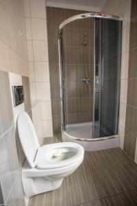 Koupelna v ubytování Mazurskie Apartamenty