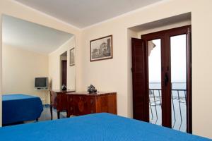 Posteľ alebo postele v izbe v ubytovaní Seaview apartments Stella Maris Agropoli