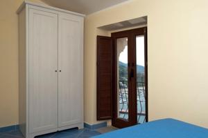 Posteľ alebo postele v izbe v ubytovaní Seaview apartments Stella Maris Agropoli