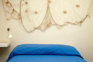 Posteľ alebo postele v izbe v ubytovaní Seaview apartments Stella Maris Agropoli