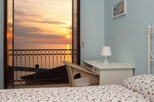 Posteľ alebo postele v izbe v ubytovaní Seaview apartments Stella Maris Agropoli