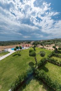 an aerial view of a park with a pool at Elaias Gi Residence in Mousata