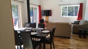 Posezení v ubytování Résidence touristique Lodge des Bois