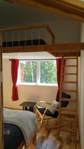 Postel nebo postele na pokoji v ubytování Résidence touristique Lodge des Bois