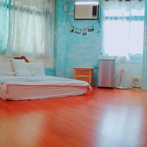 Postel nebo postele na pokoji v ubytování Pu Shi Homestay