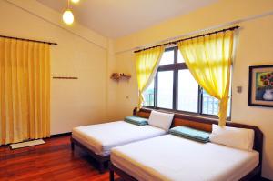 Krevet ili kreveti u jedinici u okviru objekta Tap Bed & Breakfast