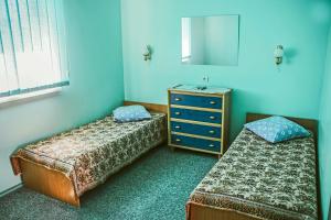 Кровать или кровати в номере Гостевой Дом Сиеста