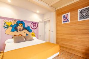 Posteľ alebo postele v izbe v ubytovaní Ten Hostel