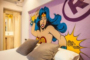 Posteľ alebo postele v izbe v ubytovaní Ten Hostel