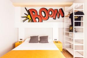 Posteľ alebo postele v izbe v ubytovaní Ten Hostel