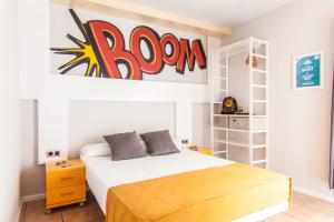 Posteľ alebo postele v izbe v ubytovaní Ten Hostel