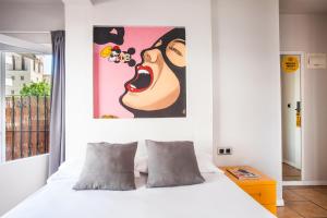 Posteľ alebo postele v izbe v ubytovaní Ten Hostel