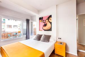 Posteľ alebo postele v izbe v ubytovaní Ten Hostel
