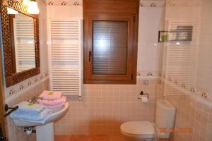 Koupelna v ubytování Apartamentos Rurales Natura