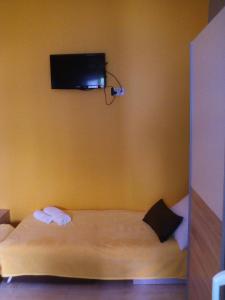 Postel nebo postele na pokoji v ubytování Apartment Flores centre