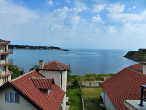 a view of the water from the roofs of houses at Studio S - Vasiliko in Tsarevo