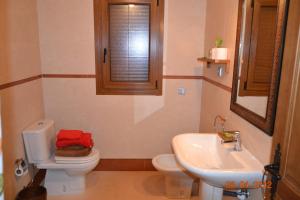Koupelna v ubytování Apartamentos Rurales Natura