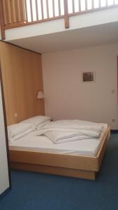 Postel nebo postele na pokoji v ubytování Hotel Brandl