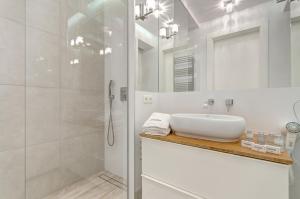 Kúpeľňa v ubytovaní Dom & House - Apartamenty Nadmorski Dwór