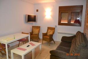 TV a/nebo společenská místnost v ubytování Apartamentos Rurales Natura