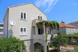a house with a frisbee in front of it at Marija Rooms in Dubrovnik +7 photos
