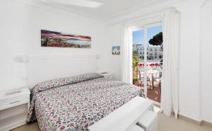 Кровать или кровати в номере Villa Pollio Guest House