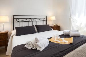 Postel nebo postele na pokoji v ubytování Hotel Porta Romana di Luce Hotels