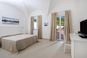 Кровать или кровати в номере Villa Pollio Guest House