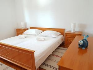 Postel nebo postele na pokoji v ubytování Apartment Marija & Iko