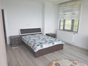 Кровать или кровати в номере Yesilhisar Aydin Pavilion
