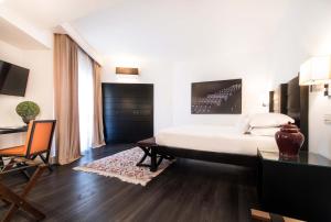 Postel nebo postele na pokoji v ubytování Hotel Michelangelo & Day SPA