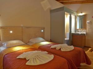 Ένα ή περισσότερα κρεβάτια σε δωμάτιο στο Sorta Apartments